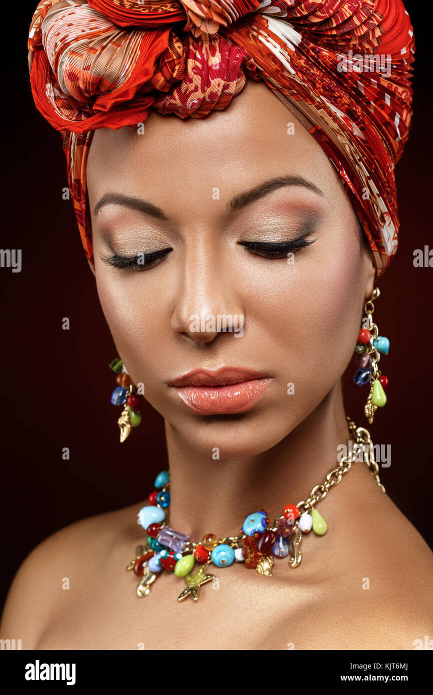 beautiful mulatto young woman with turban on head Stock Photo - Alamy