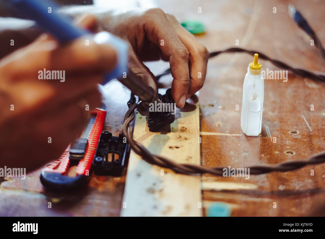 melting solder wire on soldering iron tip Stock Photo Alamy