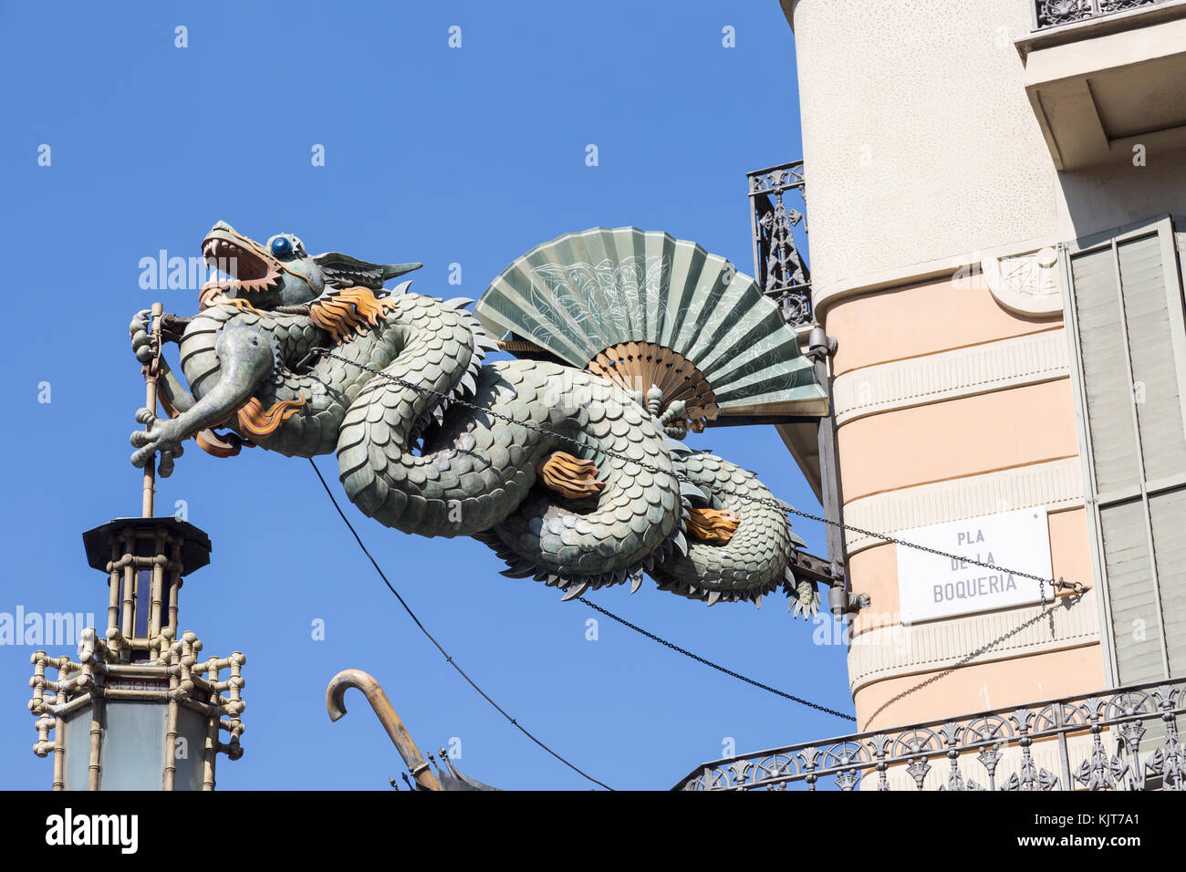 Chinese dragon on house of umbrellas (Casa Bruno Cuadros) building on La Rambla in Barcelona, Catalonia, Spain Stock Photo