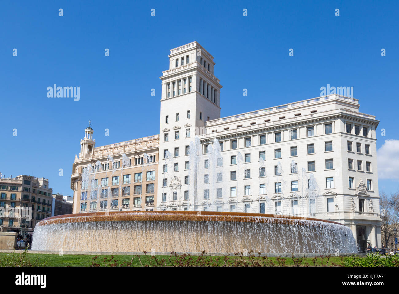 Fountain and building at Placa Catalunja or Catalonia Square, Barcelona, Spain Stock Photo