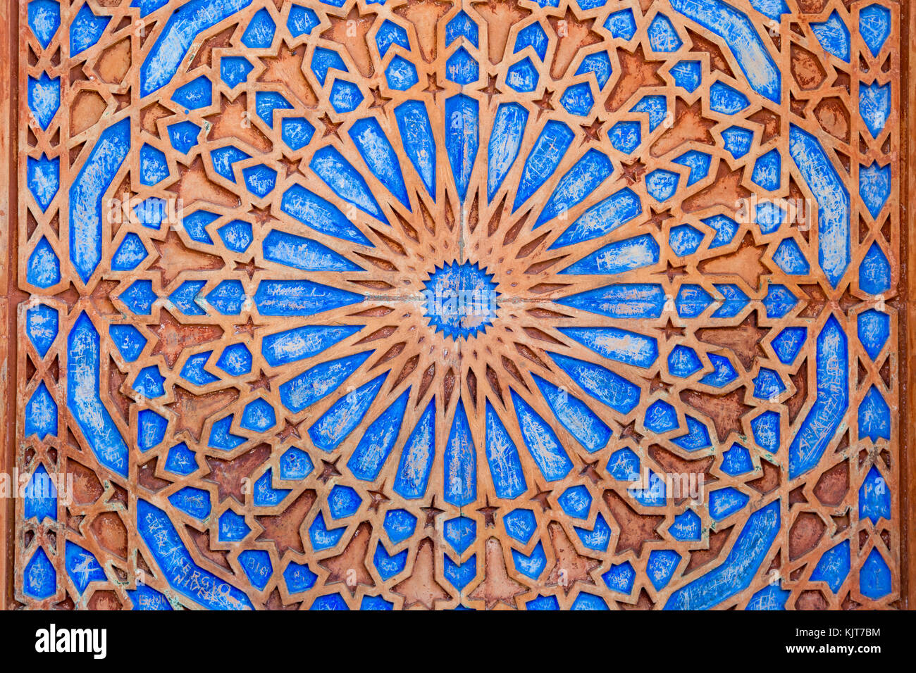Bright symmetric circle pattern in orange and blue at Castle Miramare, Triest, Italy Stock Photo