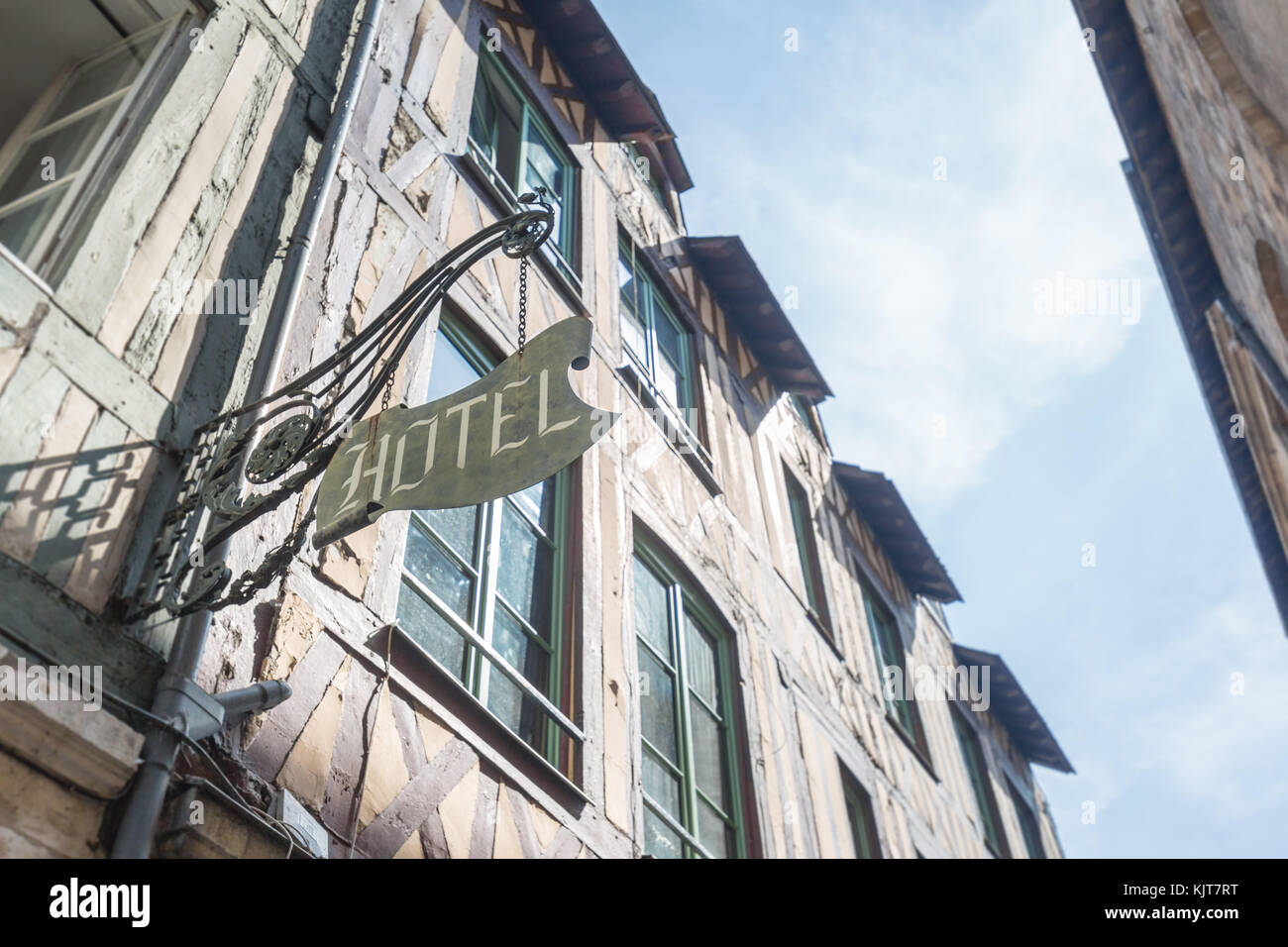Metal hotel sign on an old studwork house in Rouen, Normandie, France Stock Photo