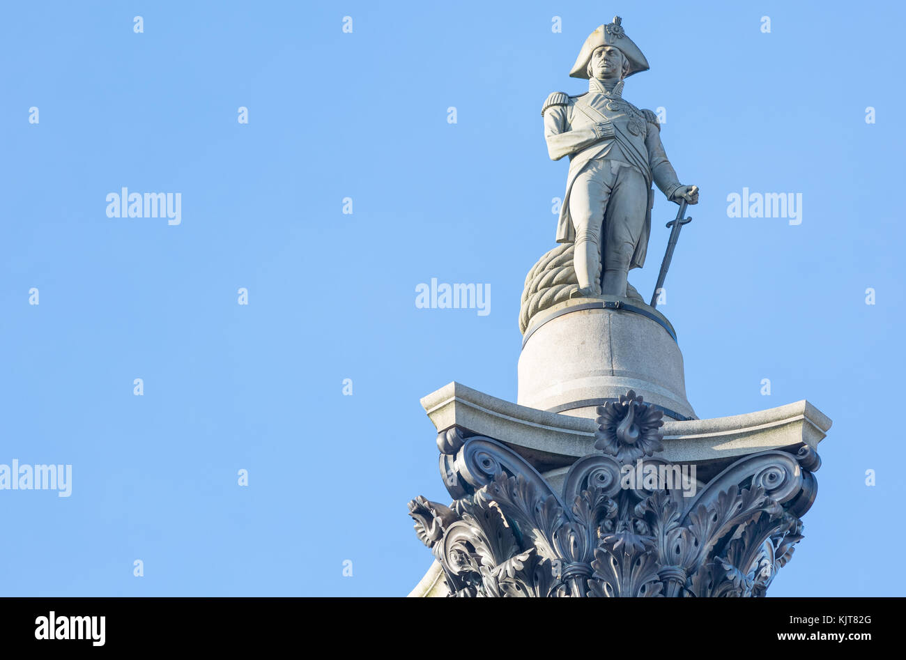 The famous statue of Admiral Nelson on Trafalgar Square in London, UK, on blue clear sky Stock Photo