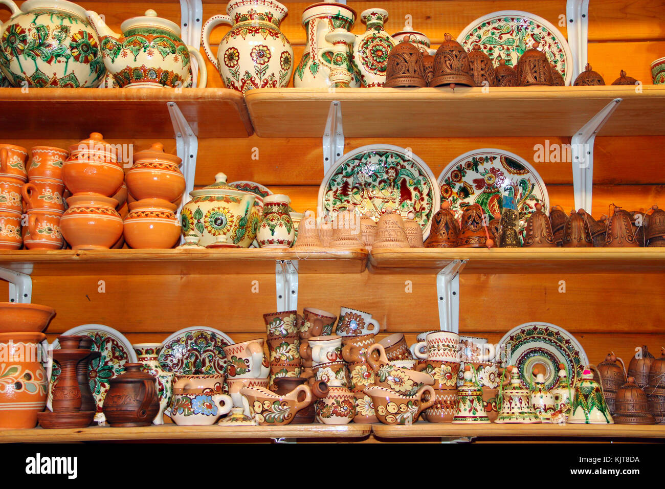 earthenware on the shelves of pottery shop Stock Photo - Alamy