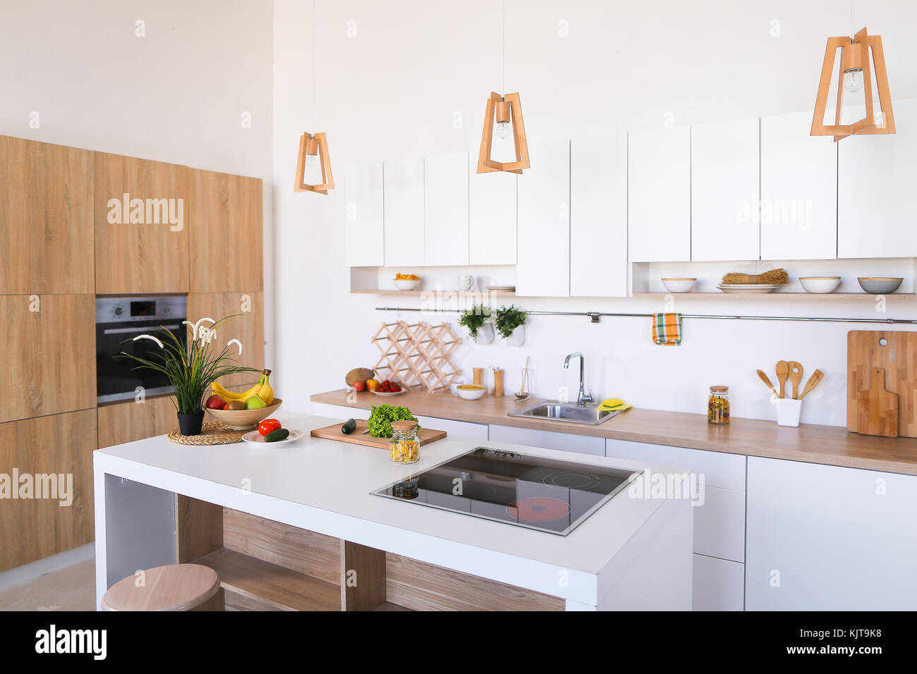 Interior of modern light kitchen with variety of appliances and Stock ...