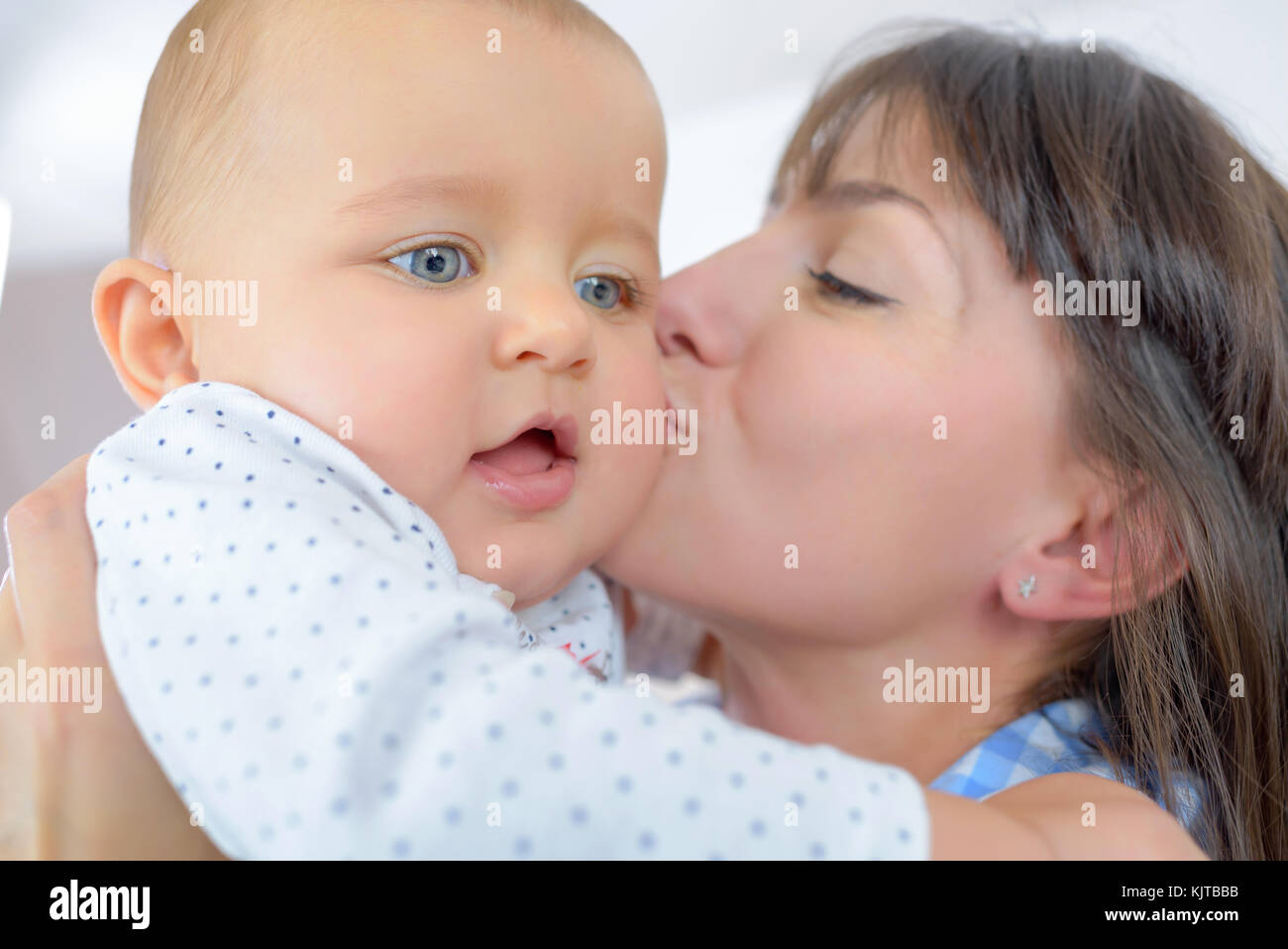 Closeup Of Mother Kissing Baby Stock Photo Alamy