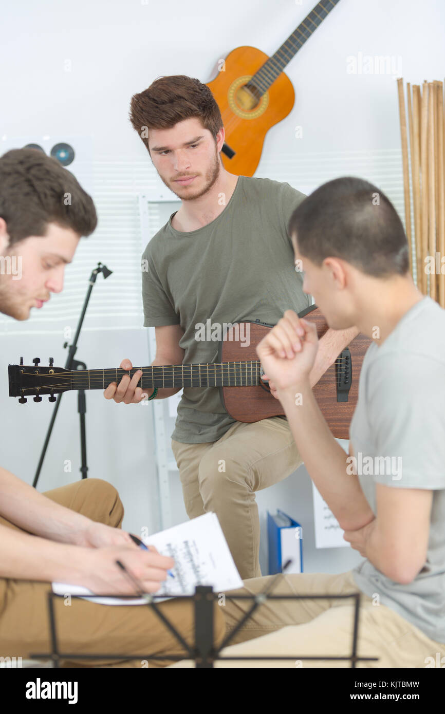 home band learning new song together Stock Photo Alamy
