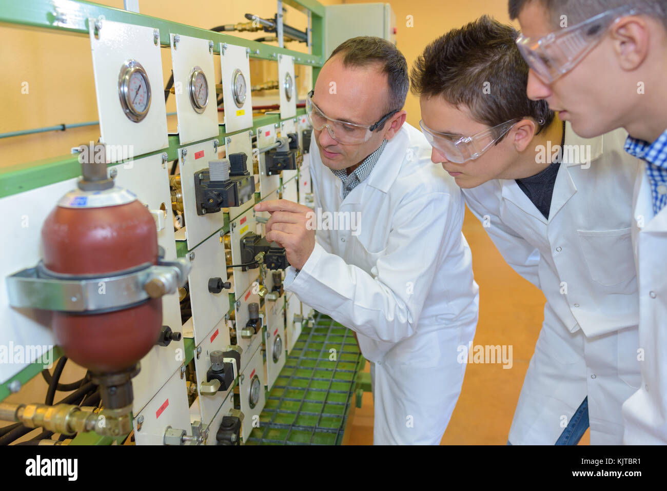 Students observing electrical panel Stock Photo - Alamy