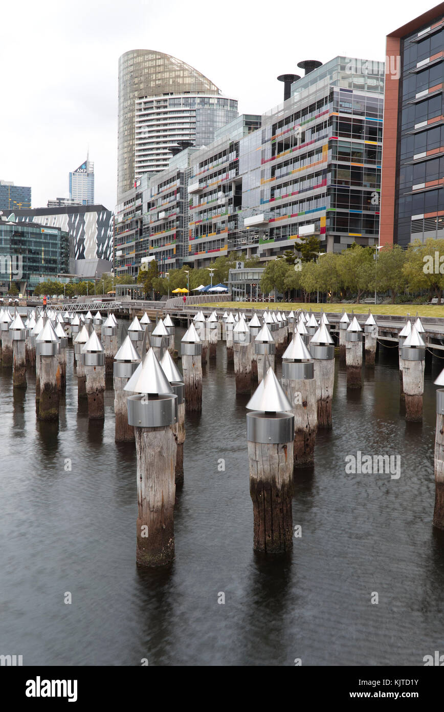 What was once a working wharf now a piece of Art National Australia bank building at Victoria Harbour promenade Docklands Melbourne Stock Photo