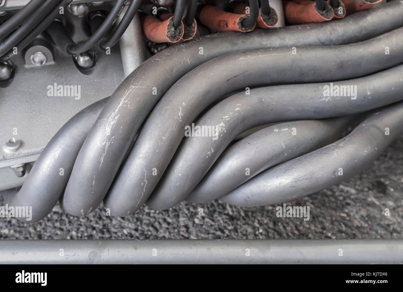 Beautiful Ferrari exhaust pipes, 1960s Goodwood Revival, Historic motor racing Stock Photo