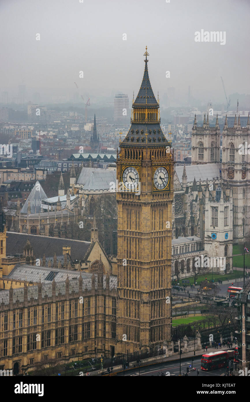Big Ben and Westminster bridge in a typical foggy morning. Winter in London, United Kingdom. Stock Photo