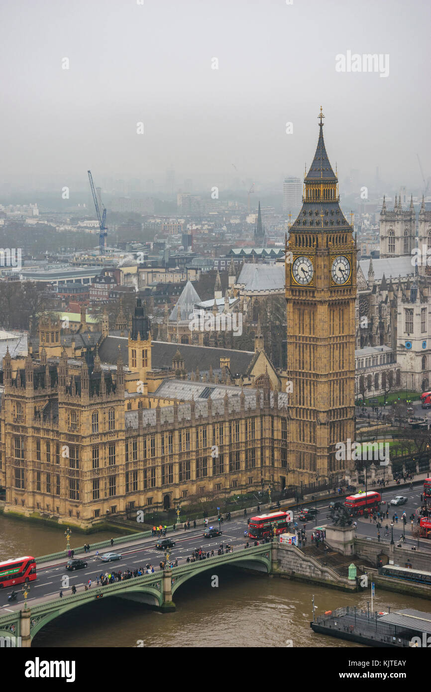 Big Ben and Westminster bridge in a typical foggy morning. Winter in London, United Kingdom. Stock Photo