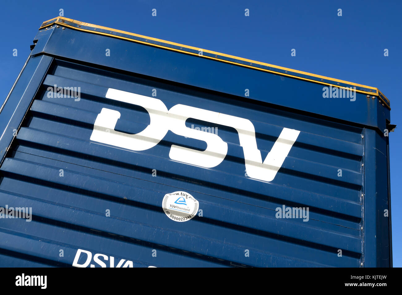 DSV curtain side trailer. DSV A/S is a Danish transport and logistics company offering transport services worldwide by road, air, sea and train. Stock Photo
