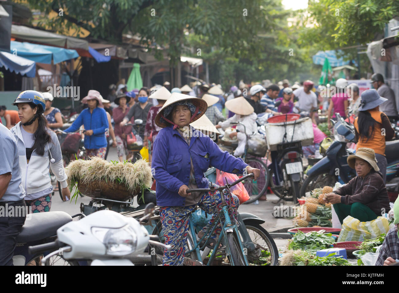 Saigon, Vietnam - June 2017: Vietnam busy morning street market, Saigon, Vietnam. Stock Photo