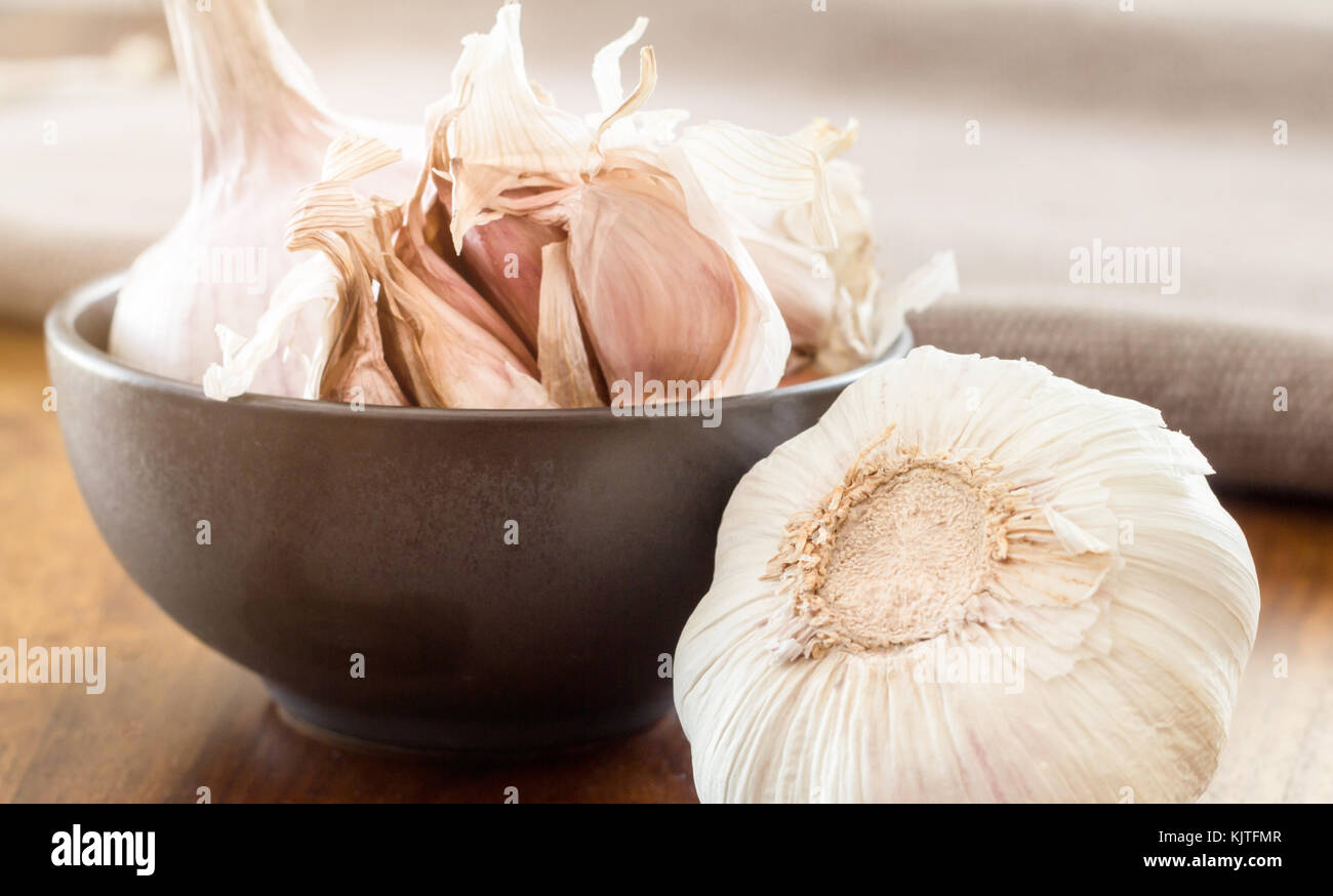 garlic cloves on table Stock Photo