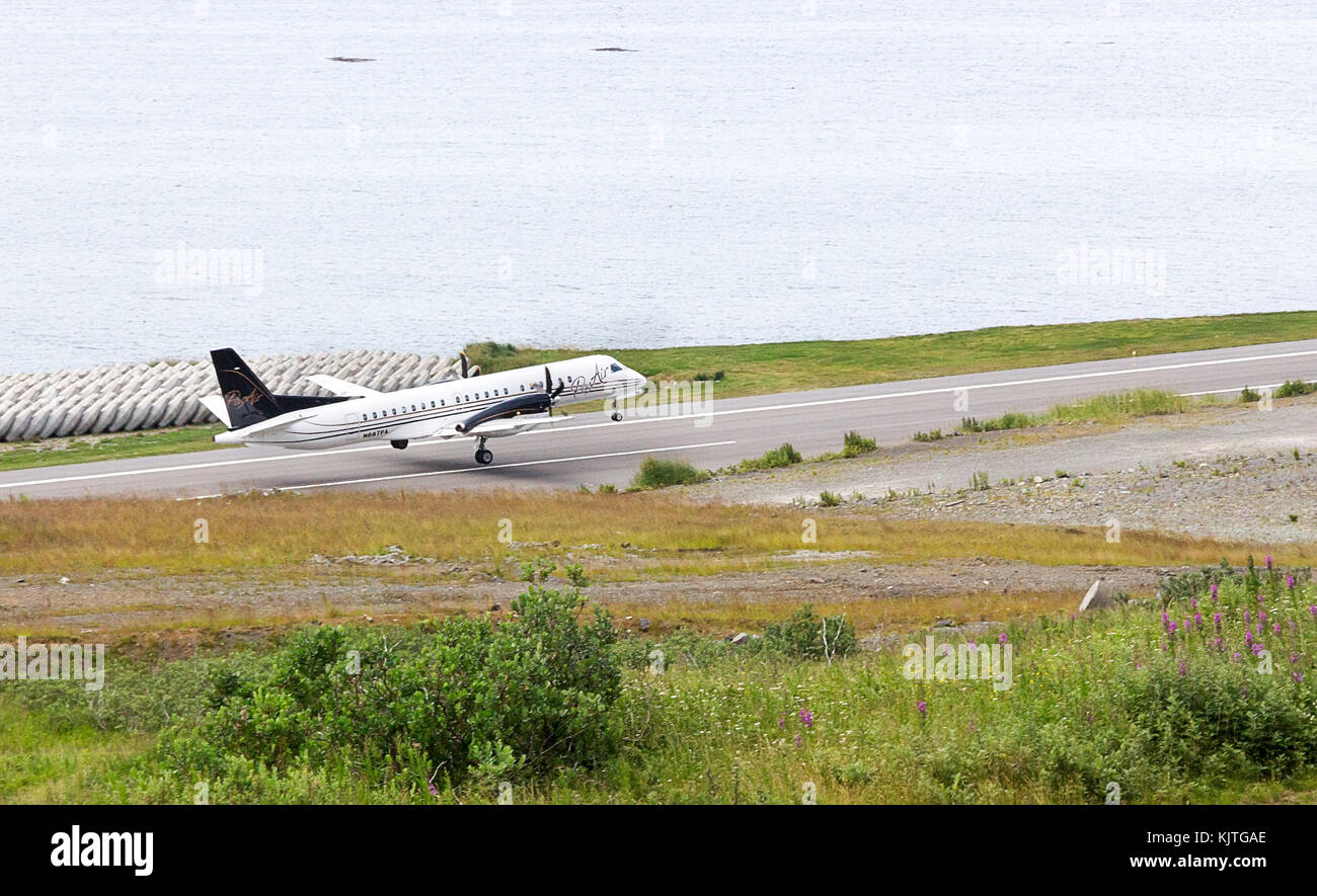 Dutch Harbor, Unalaska, Alaska, USA - August 14th, 2017: A SAAB 2000s aircraft of Pen Air is taking off at Tom Madsen, Dutch Harbor, Unalaska. Stock Photo
