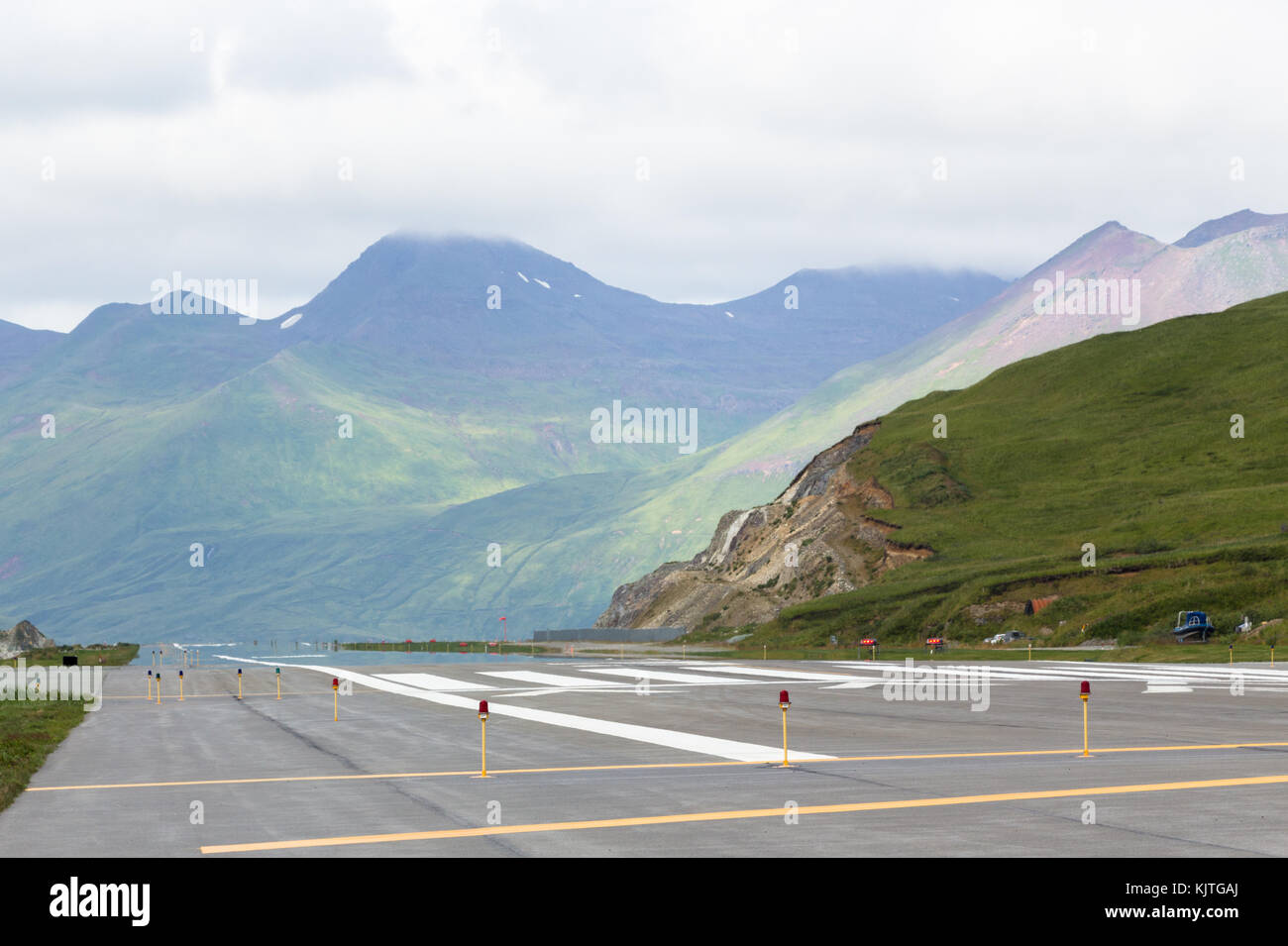 Dutch Harbor, Unalaska, Alaska, USA - August 14th, 2017: View of the runway of the Tom Masden Airport, Dutch Harbor, Unalaska, Alaska. Stock Photo