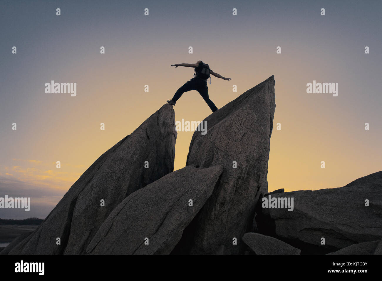Rock Climbing at Sunset Stock Photo