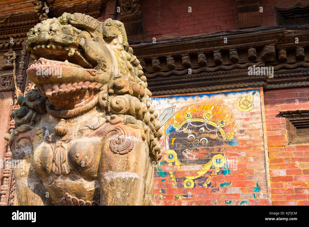 Lion statue warding a gate, Mul Chowk courtyard, Hanuman Dhoka Royal Palace, Patan Durbar Square, Unesco World Heritage Site, Kathmandu valley, Lalitp Stock Photo