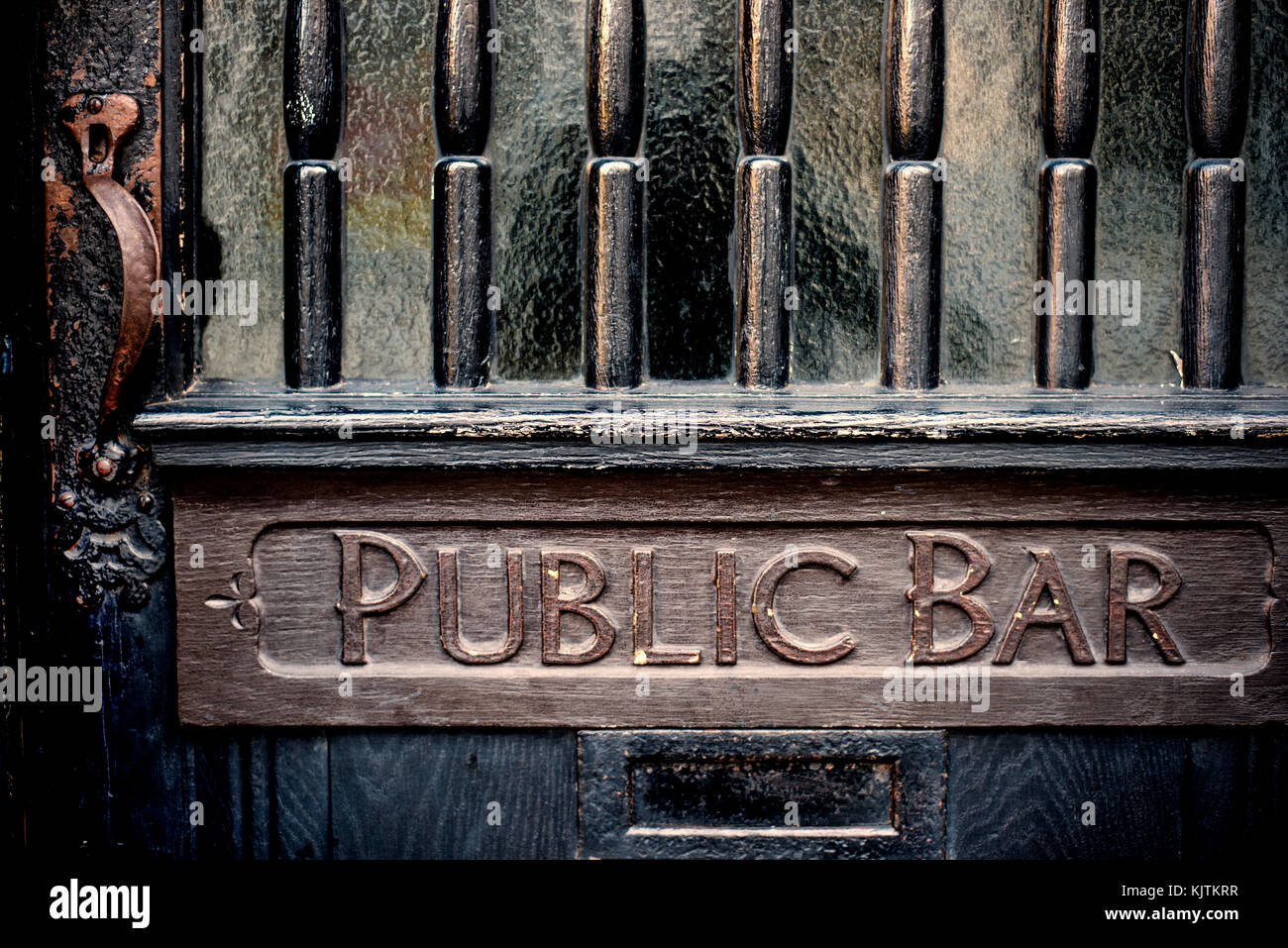 Old fashioned door with sign 'Public Bar', England Stock Photo