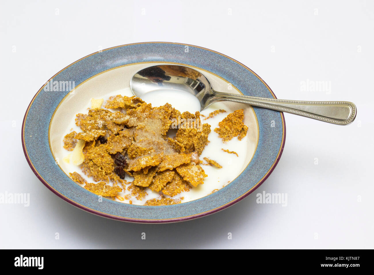 A bowl of fruit and fibre breakfast cereal served with cold fresh semi