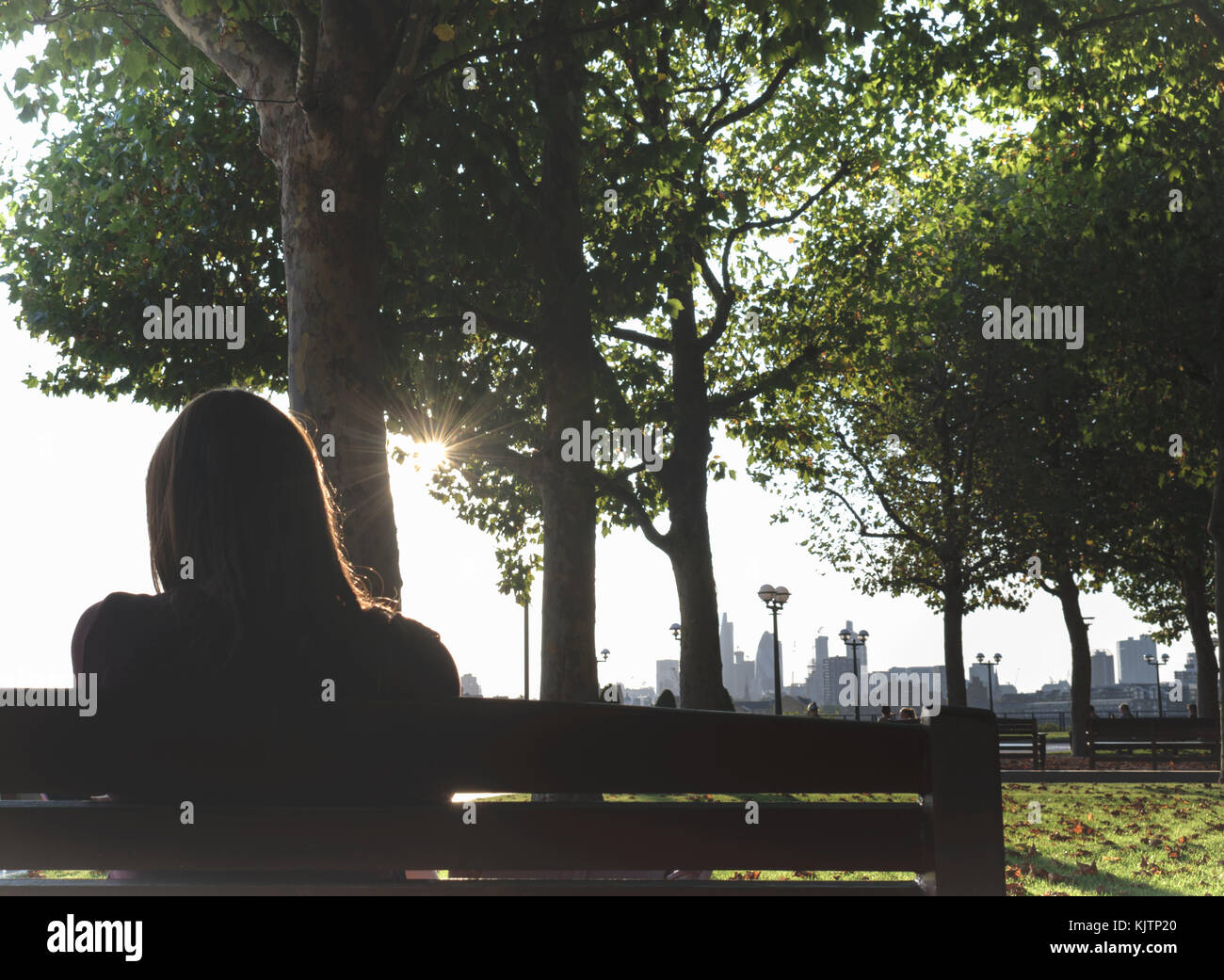 Girl watching sunset hi-res stock photography and images - Alamy