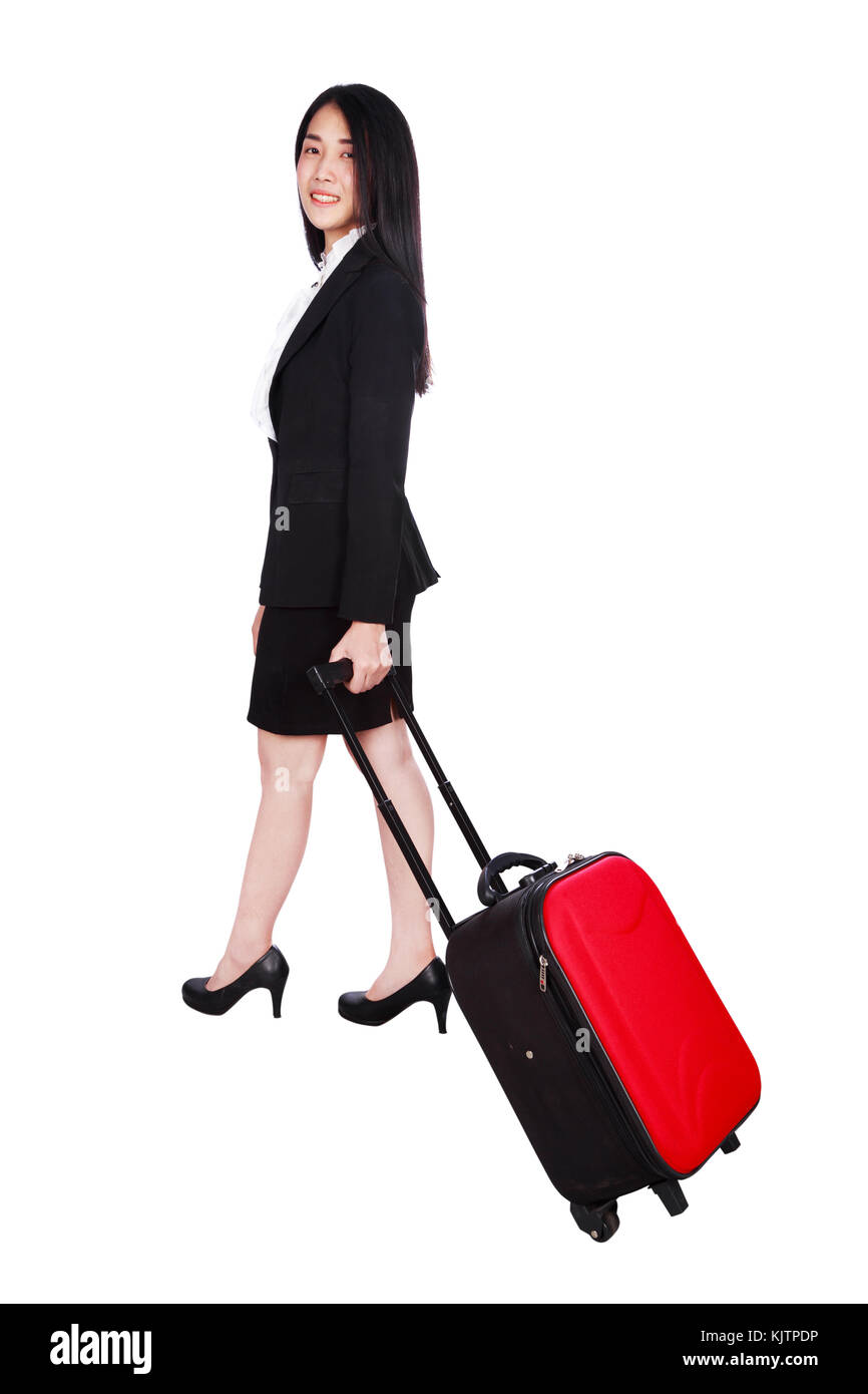 young business woman with a suitcase isolated on white background Stock