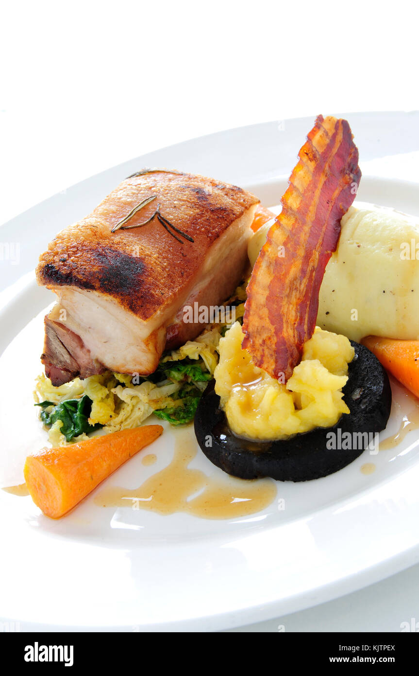 plated pork dinner meal Stock Photo Alamy