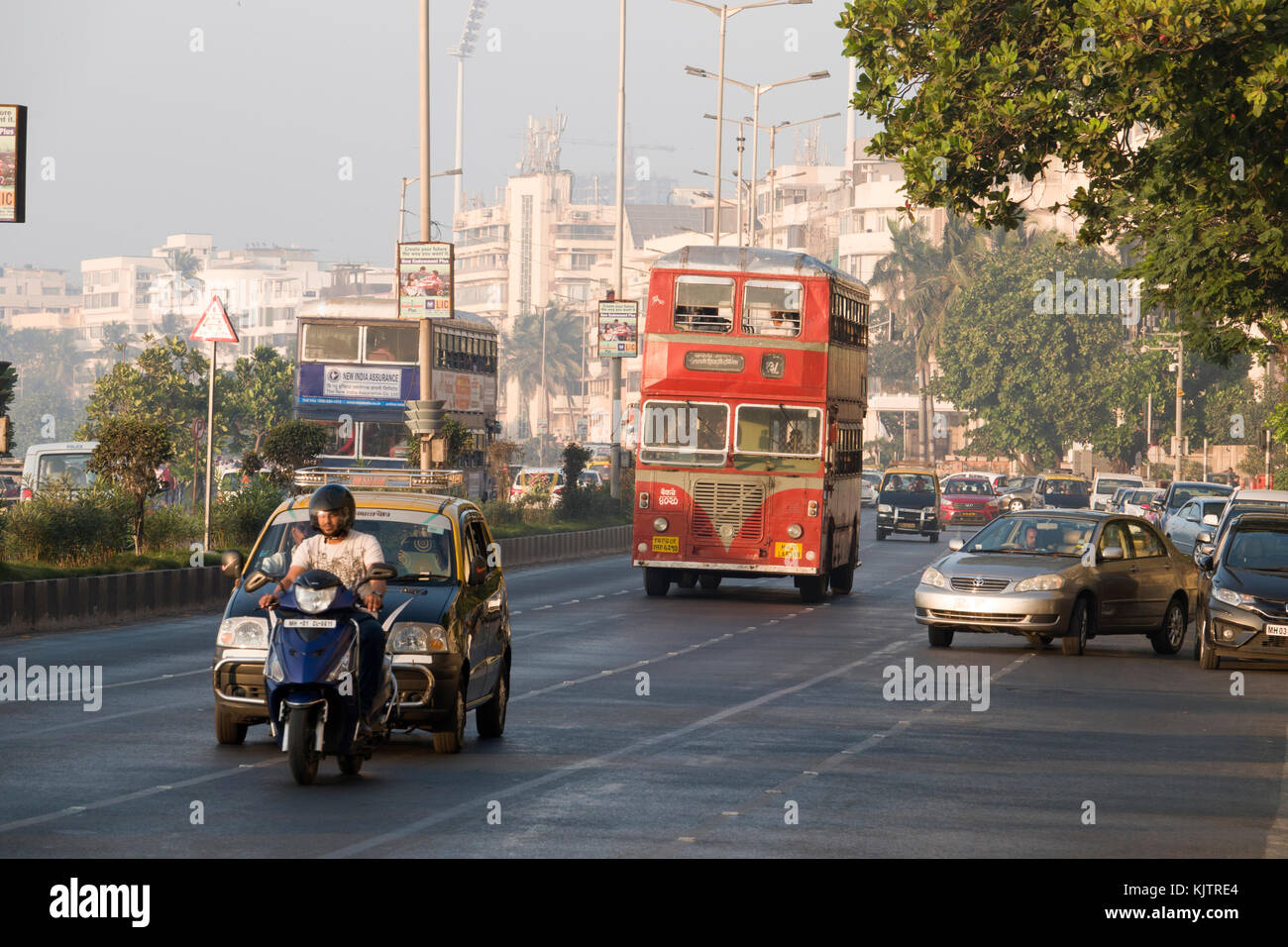 Traffic including double decker bus on Marine Drive, Mumbai Stock Photo