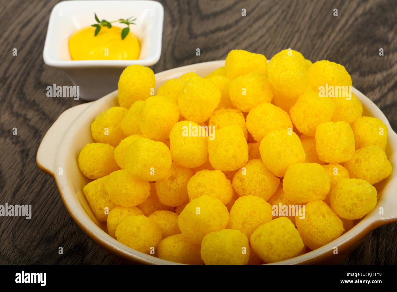 Cheese corn balls with sauce Stock Photo Alamy