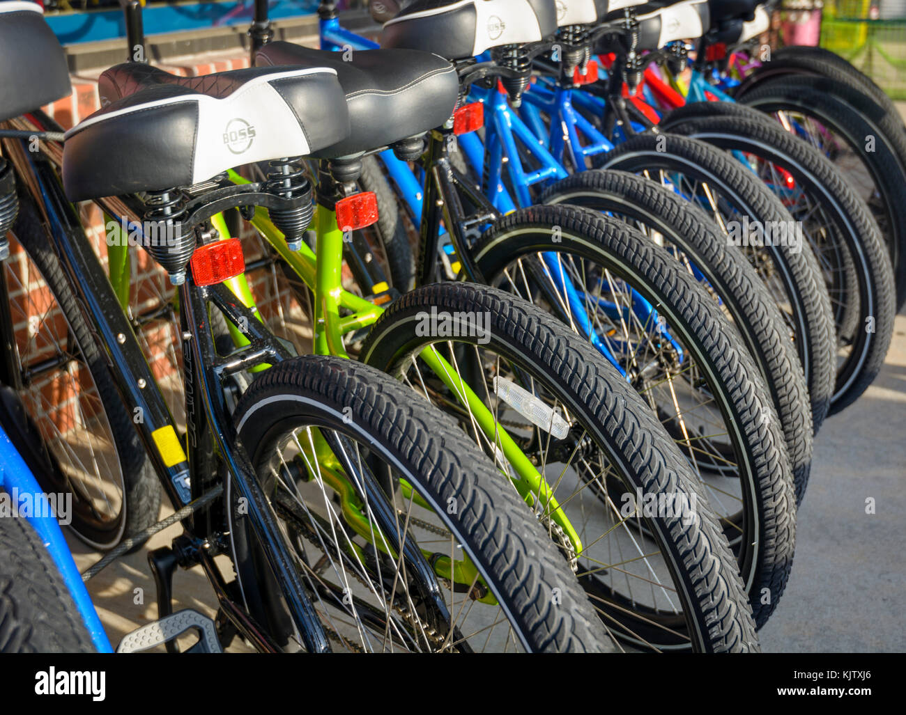 Line of bikes for sale outside of a bike shop Stock Photo