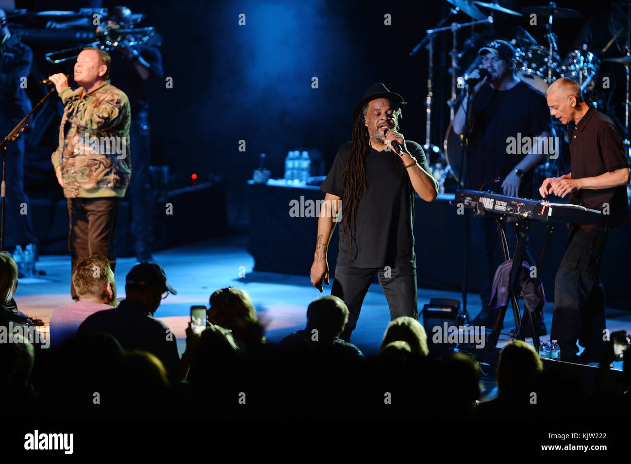 POMPANO BEACH FL - AUGUST 15: Ali Campbell of UB40 performs at The Pompano Beach Amphitheater on August 15, 2016 in Pompano Beach, Florida.    People:  Ali Campbell, Astro, Mickey Virtue Stock Photo