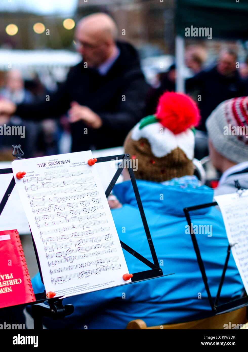 Gloucestershire, UK. 26th Nov, 2017. 26th November 2017. Visitors attend the victorian themed market at Gloucester historic docks.  Seasonal foods are available at many of the stalls. Entertainment comes from re-enactors and a band. The Cinderford Silver band from the Forest of Dean played The Snowman Stock Photo