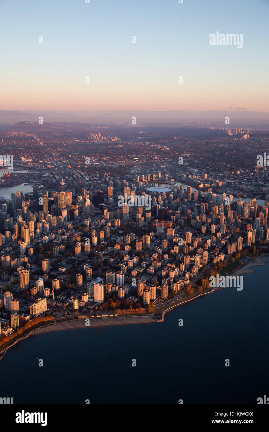 Aerial view from an airplane of Downtown City landscape during a ...