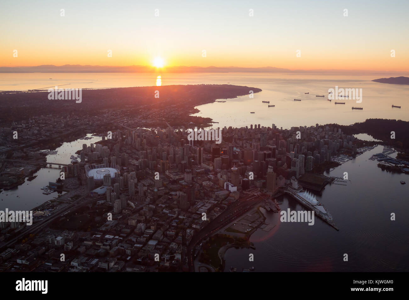 Aerial view from an airplane of Downtown City landscape during a ...