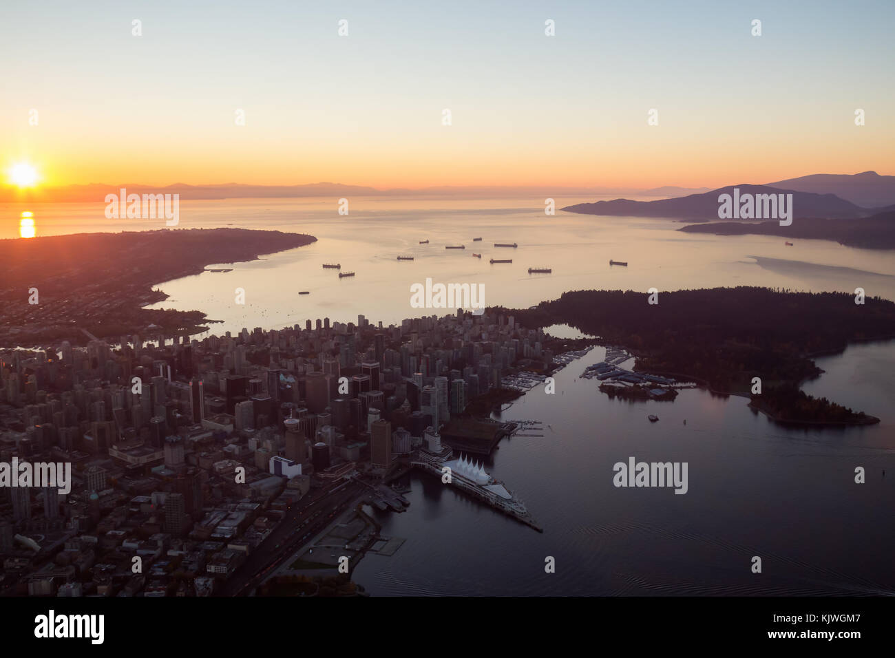 Aerial view from an airplane of Downtown City landscape during a ...