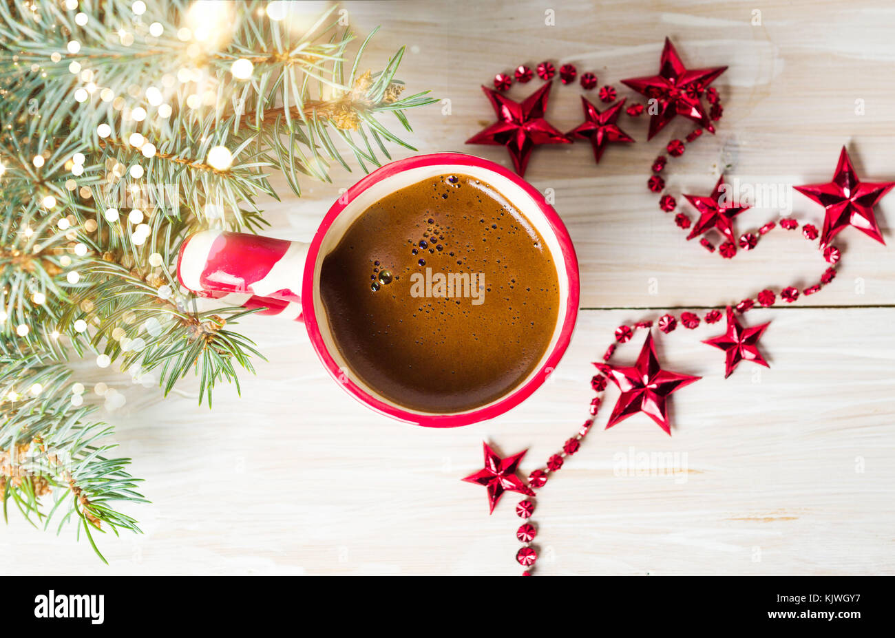 Cup of coffee with festive decorations on the table Stock Photo