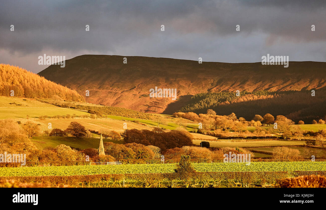 Landscape - Hills and Spire in winter light. Stock Photo