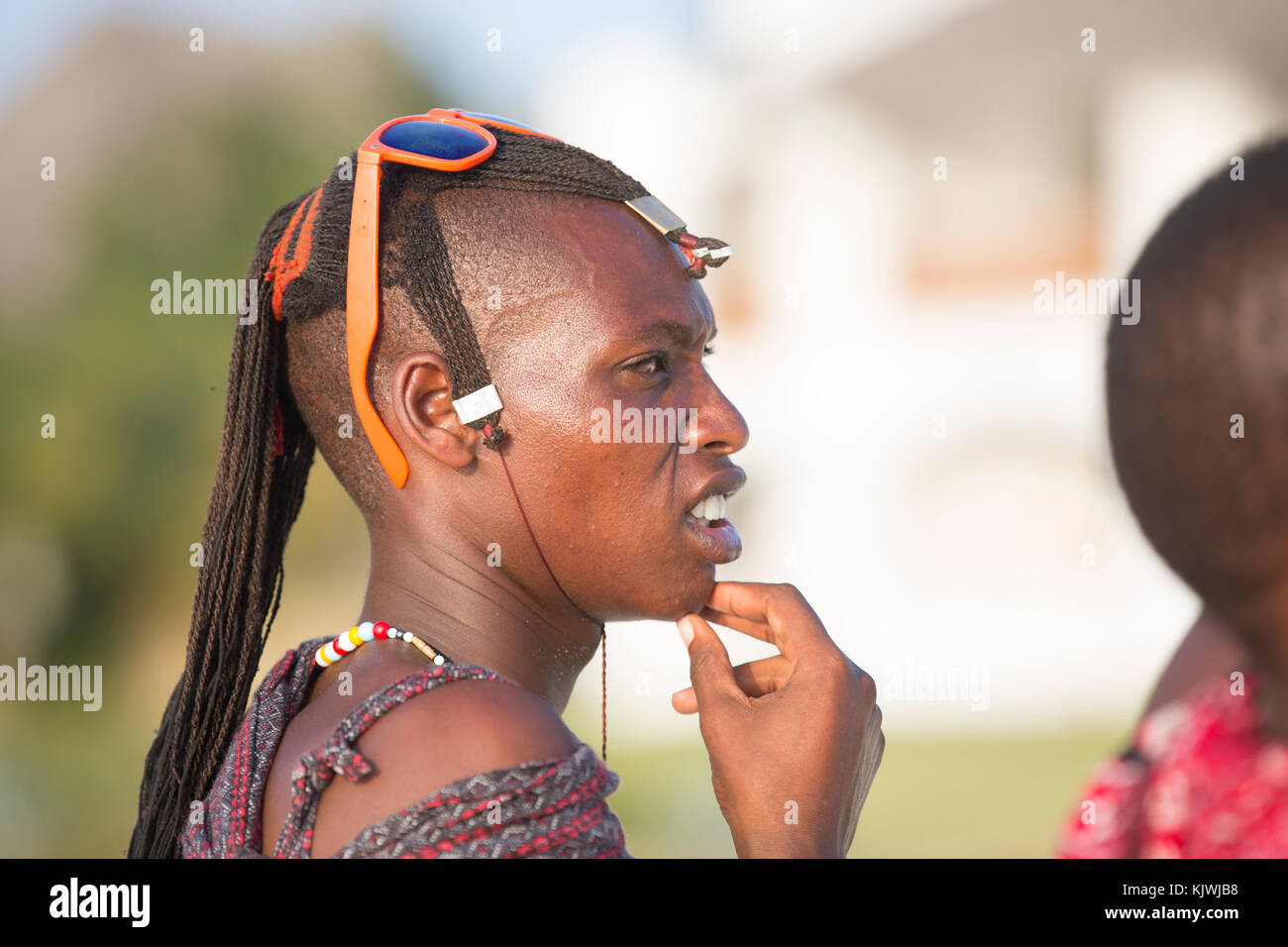 Zanzibar, Tanzania; Young Maasai warriors at a hotel in the north of the island perform for tourists. Stock Photo