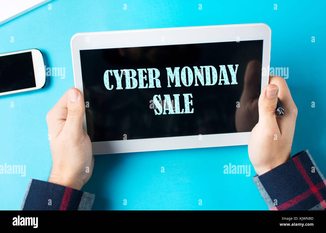 Cyber Monday sale sign on a tablet device point of view Stock Photo