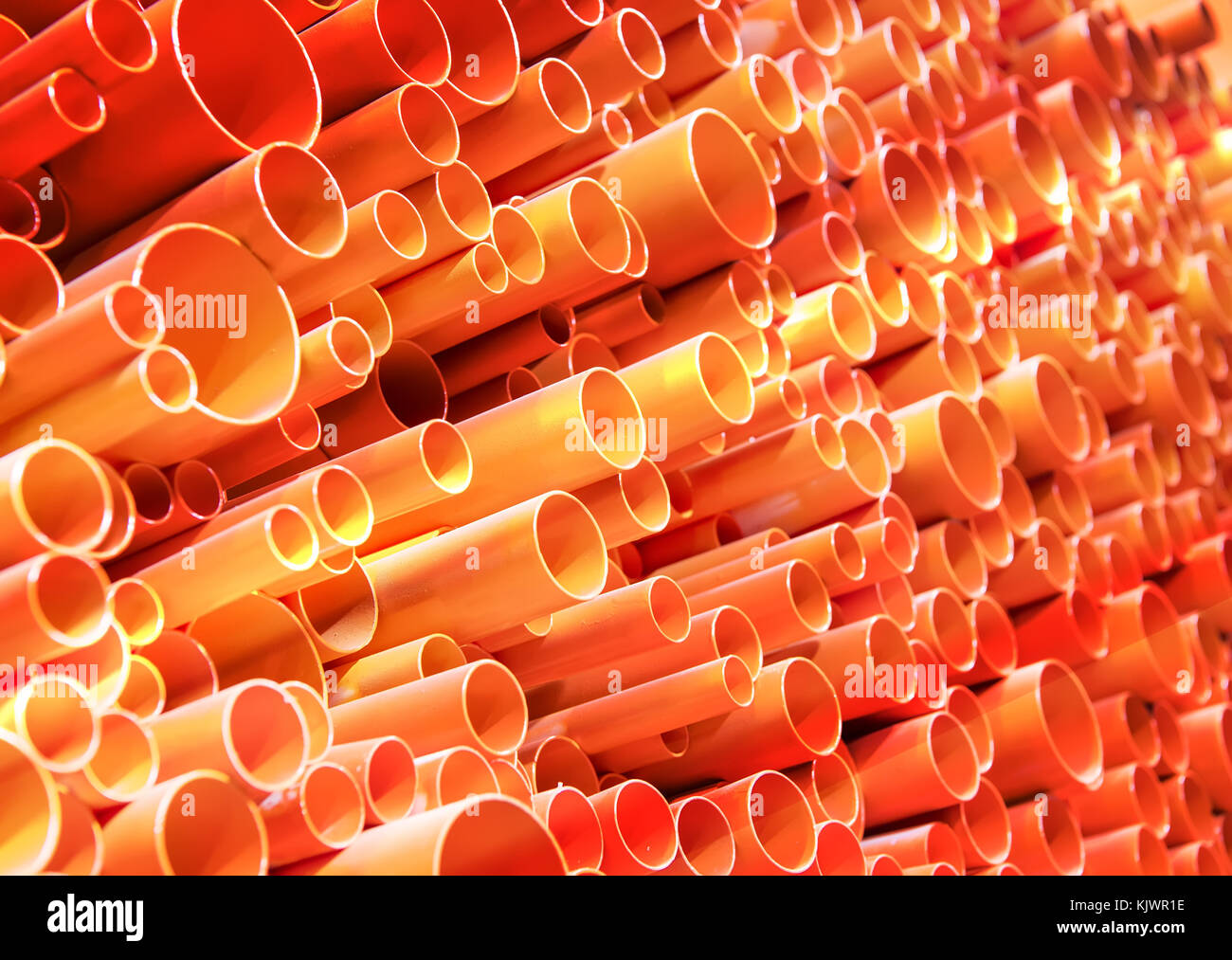 PVC pipes stacked in construction site Stock Photo - Alamy