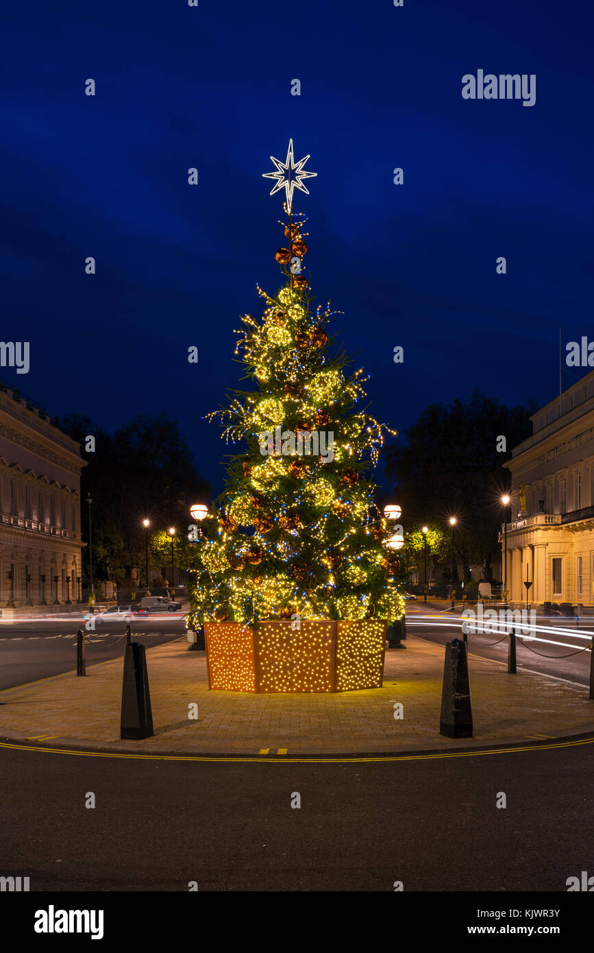 Beautifully decorated Christmas tree on Waterloo Place in London