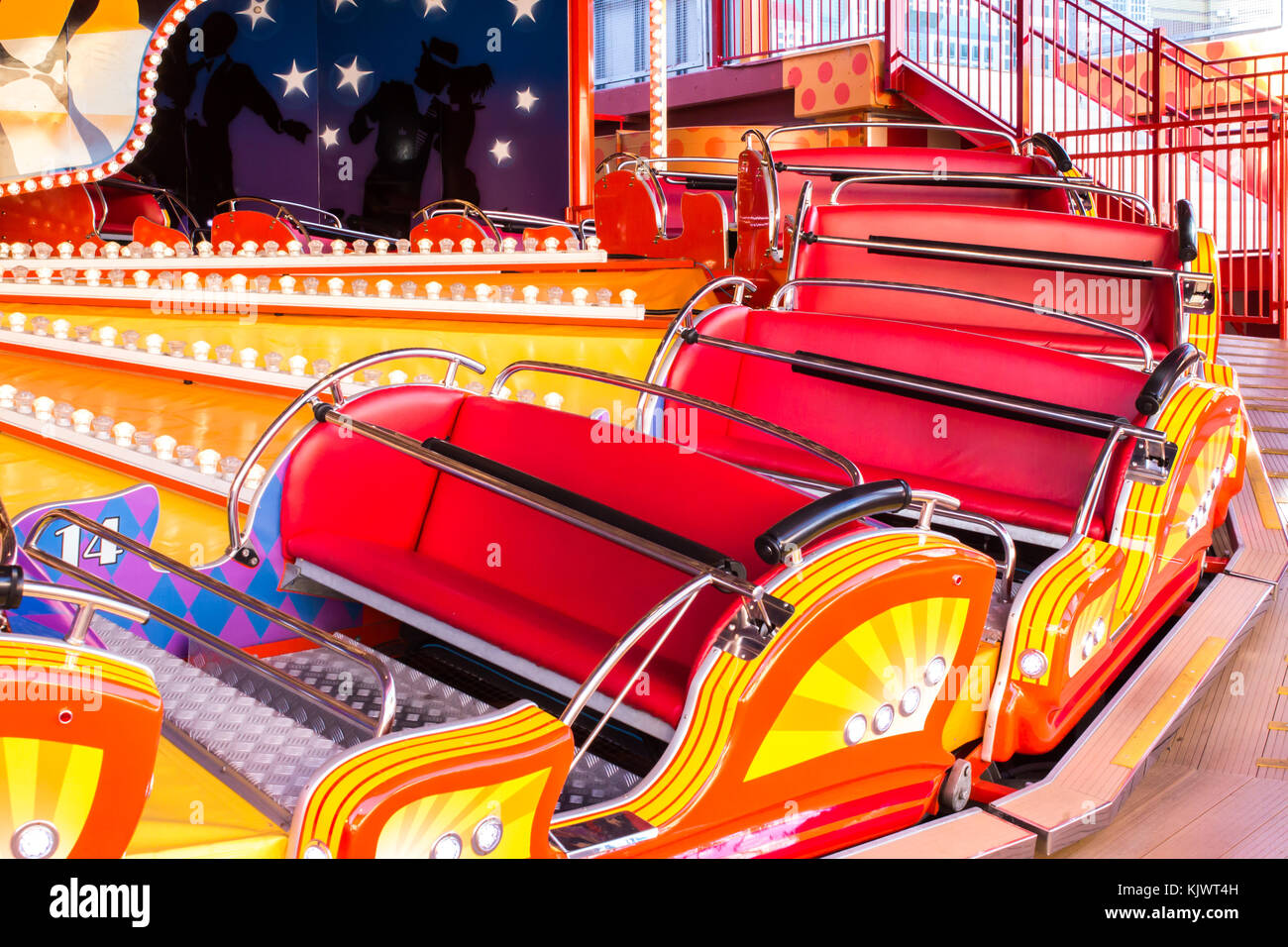 Red and yellow carnival festival carriage amusement ride Stock Photo
