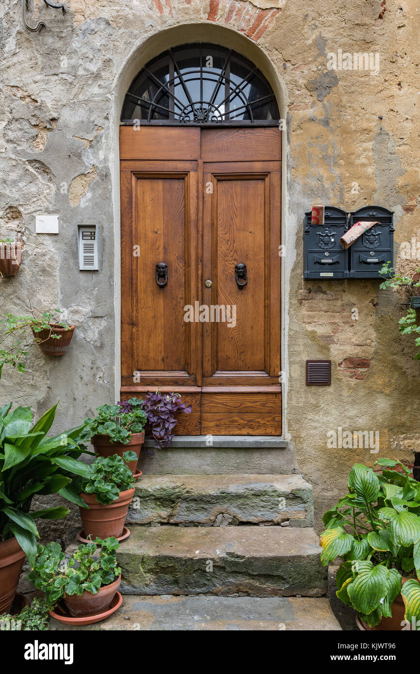 Massive wooden doors typical of southern Italy. Wooden door set in an