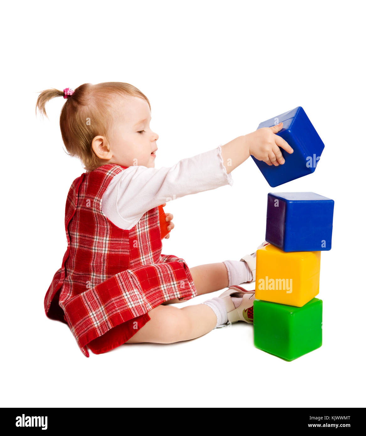 Little Girl playing with colorful toys isolated on white Stock Photo ...