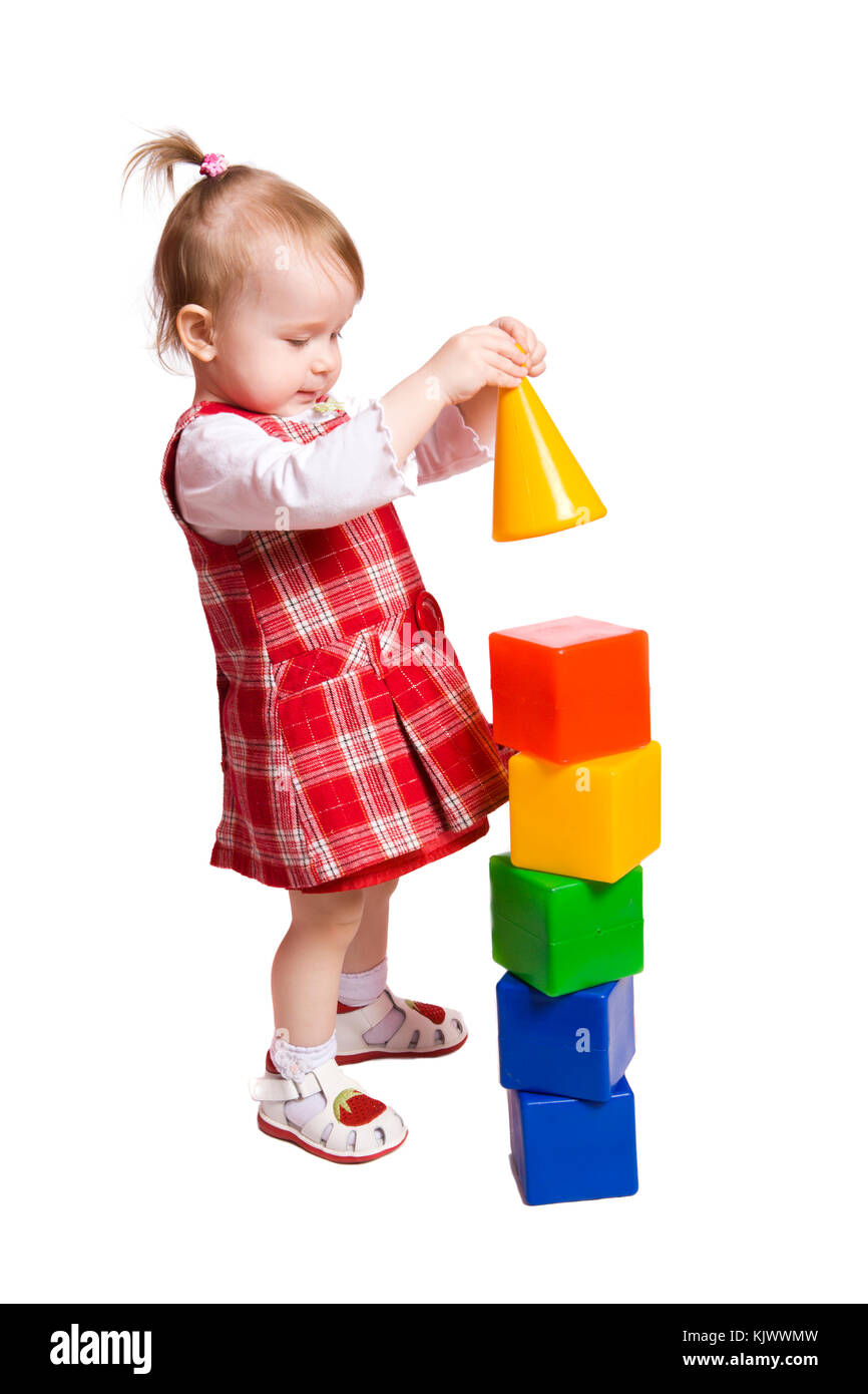 Little Girl playing with colorful toys isolated on white Stock Photo ...