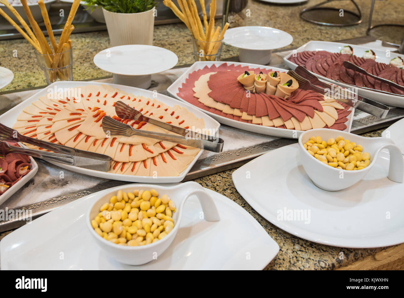 Selection display of cold meat salad food at a luxury restaurant buffet bar area Stock Photo