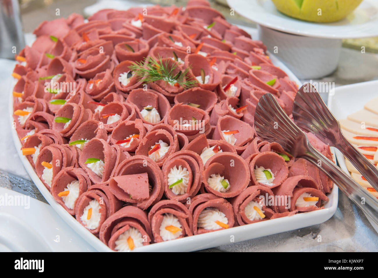 Selection display of cold meat salad food at a luxury restaurant buffet bar area Stock Photo