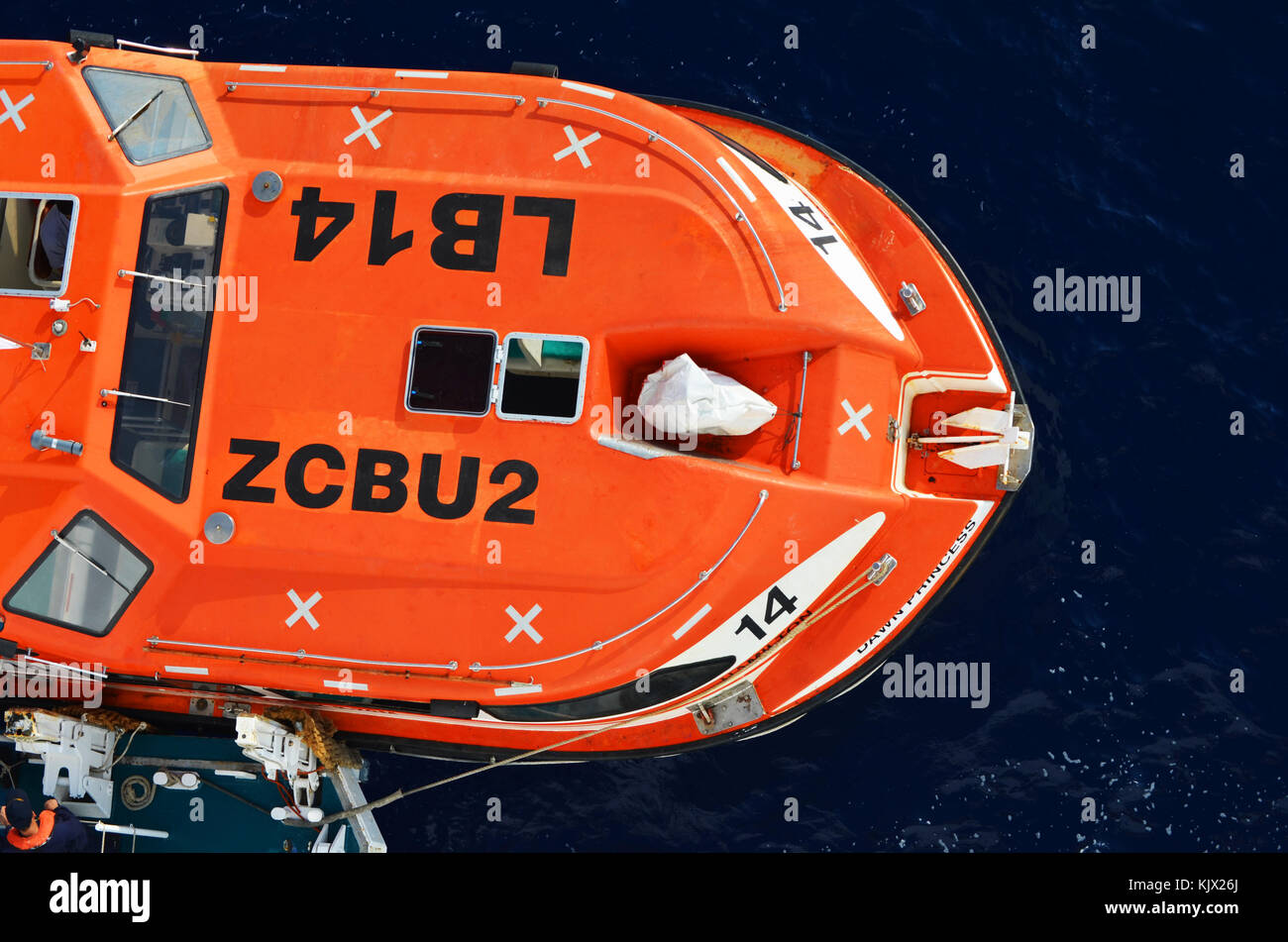 Orange Life Boat on ocean. View from above. Stock Photo