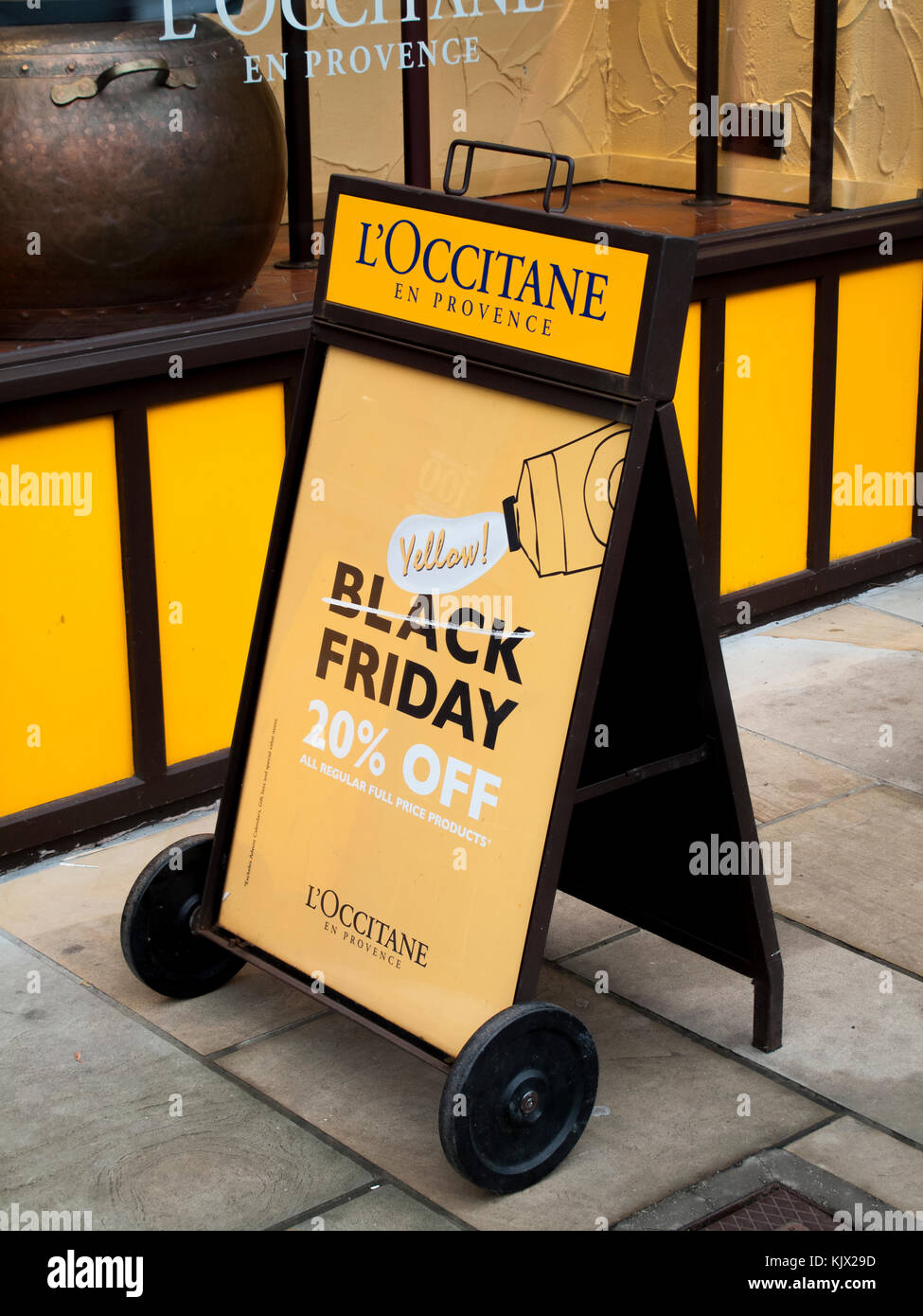 Black Friday signs in high street stores advertising price discounts Stock Photo Alamy